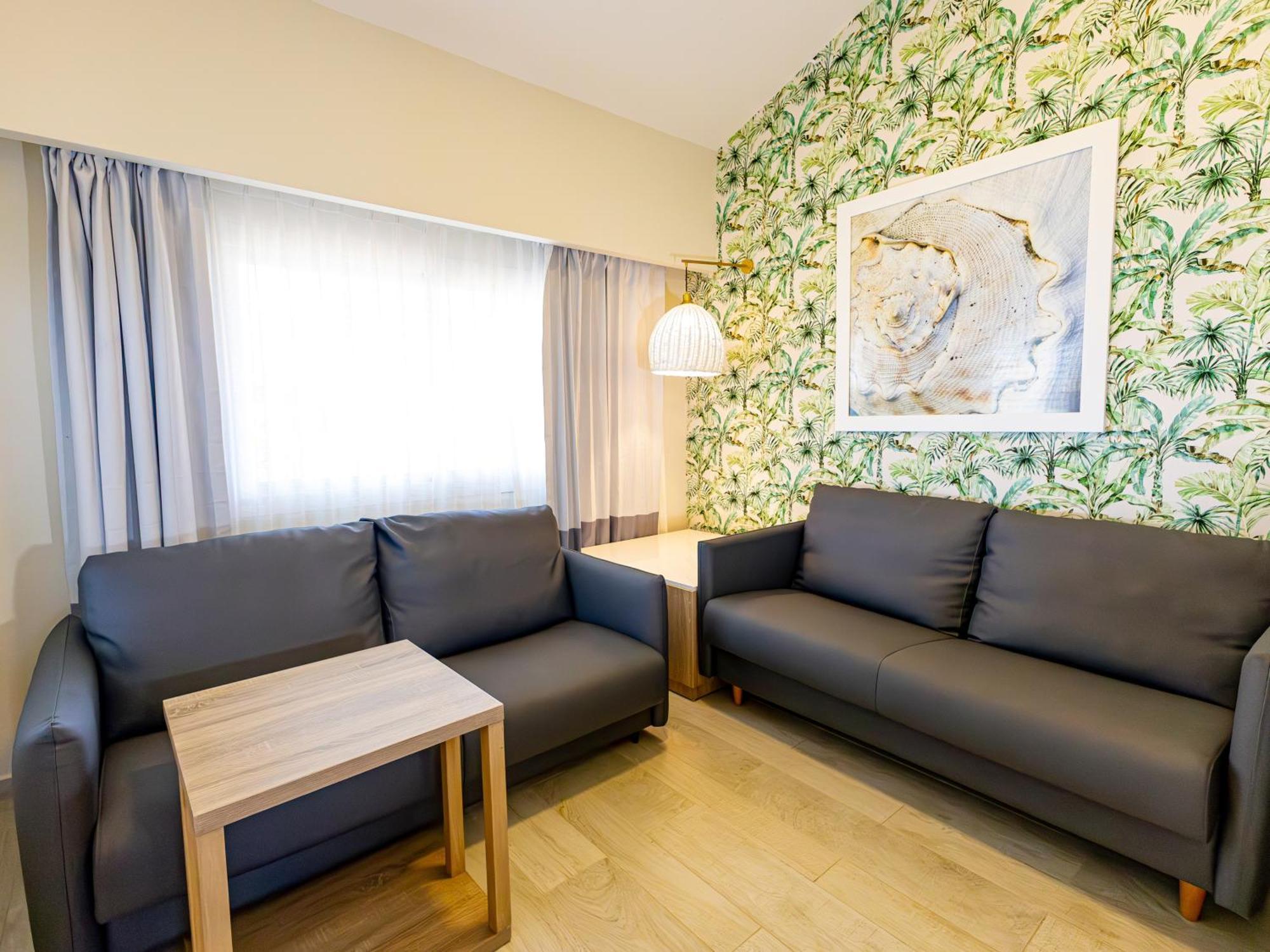 グランド シレニス プンタカナ リゾート カジノ&アクアゲームス オール インクルーシブ Uvero Alto エクステリア 写真 A living room in a hotel